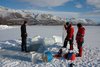 People working on the ice